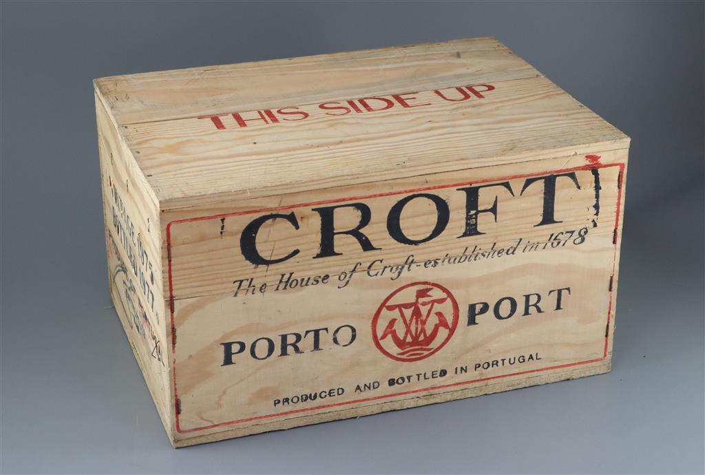 A case of Croft 1975 vintage Port, bottled 1977, original opened wooden crate (12 bottles)